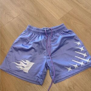Purple Athletic Shorts with White Graphics
